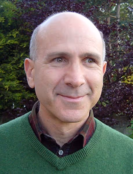 Mark Ballabon portrait picture on green sweater