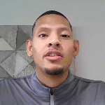 young male speaking into camera frame