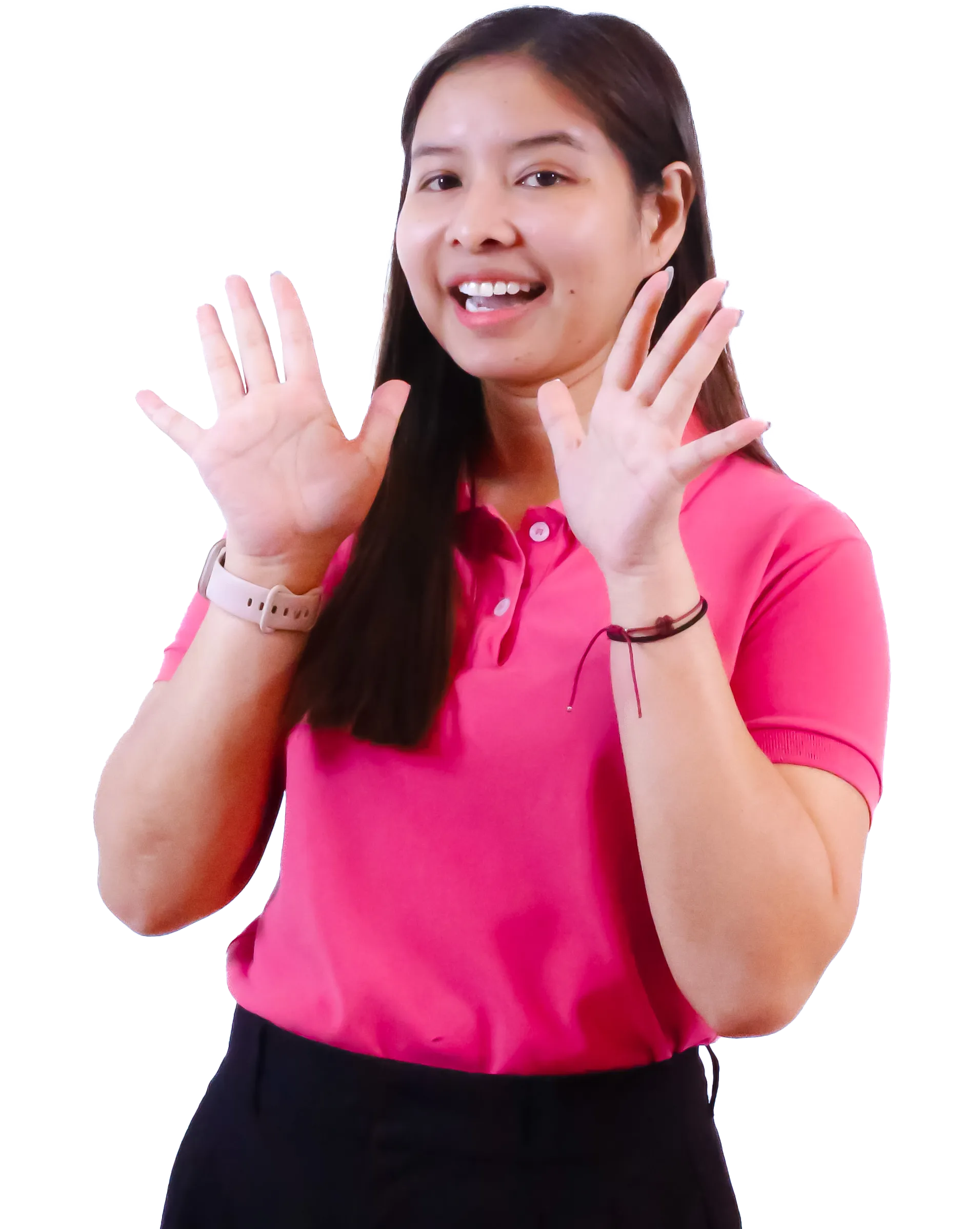 A smiling young woman in a pink polo raises her hands with fingers spread.