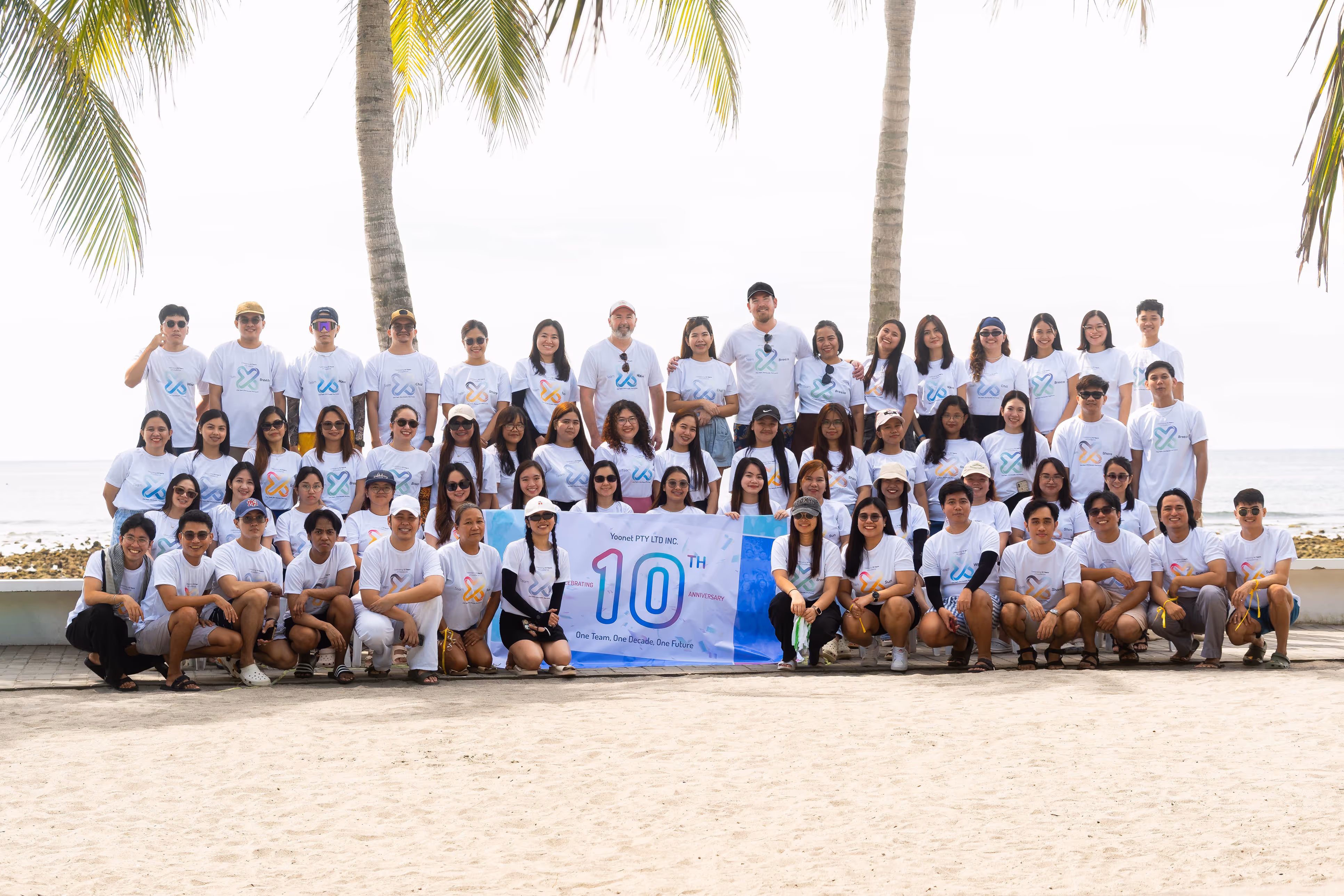 Yoonet employees posed for a group photo during their 10th year anniversary celebration.