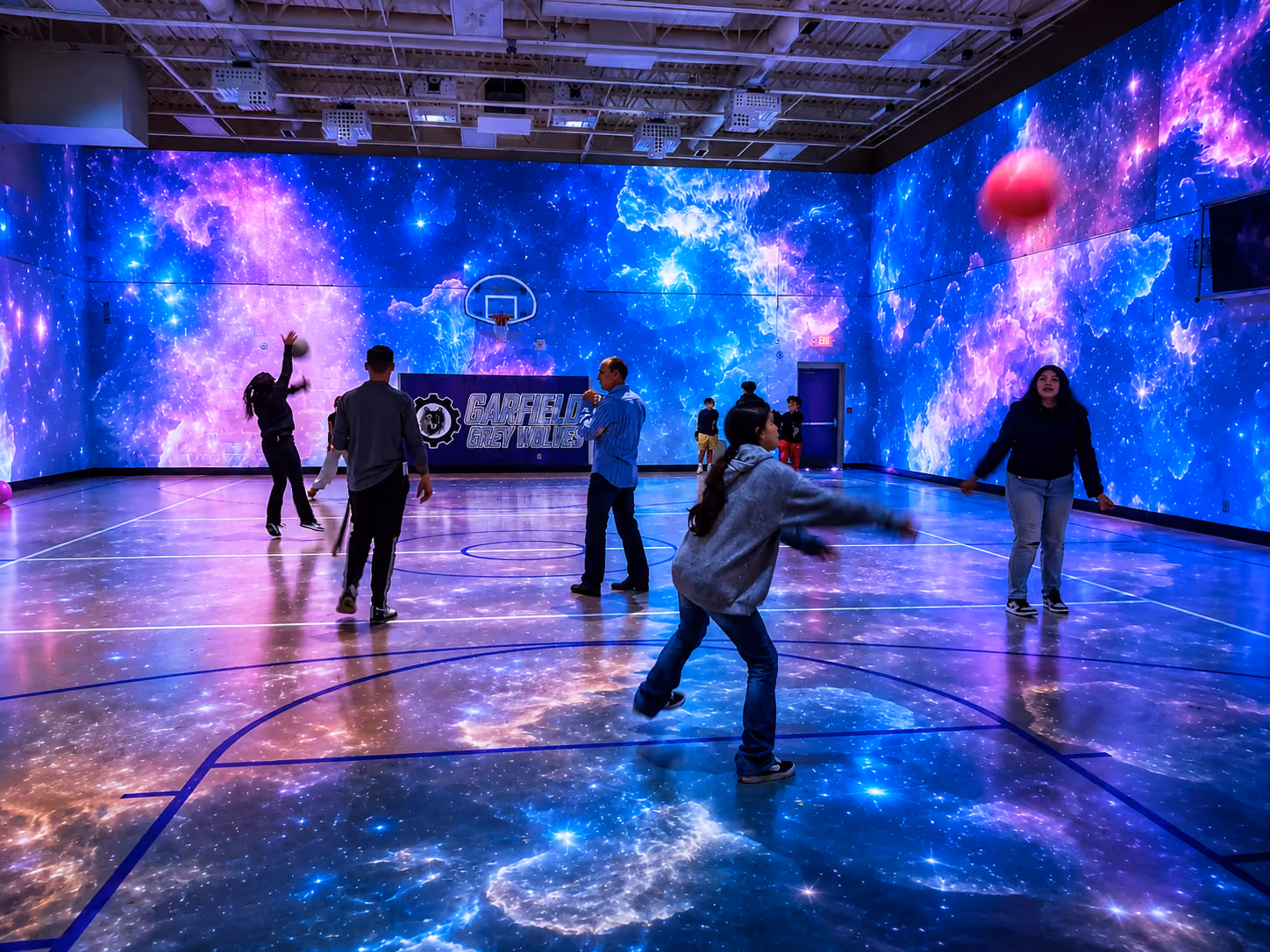 An image of kids playing in the Garfield Middle School gymnasium
