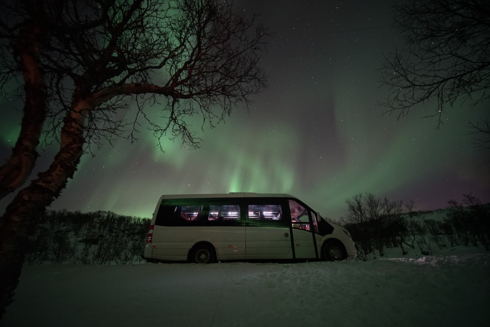 Polar Northern Light Chase in a Minibus
