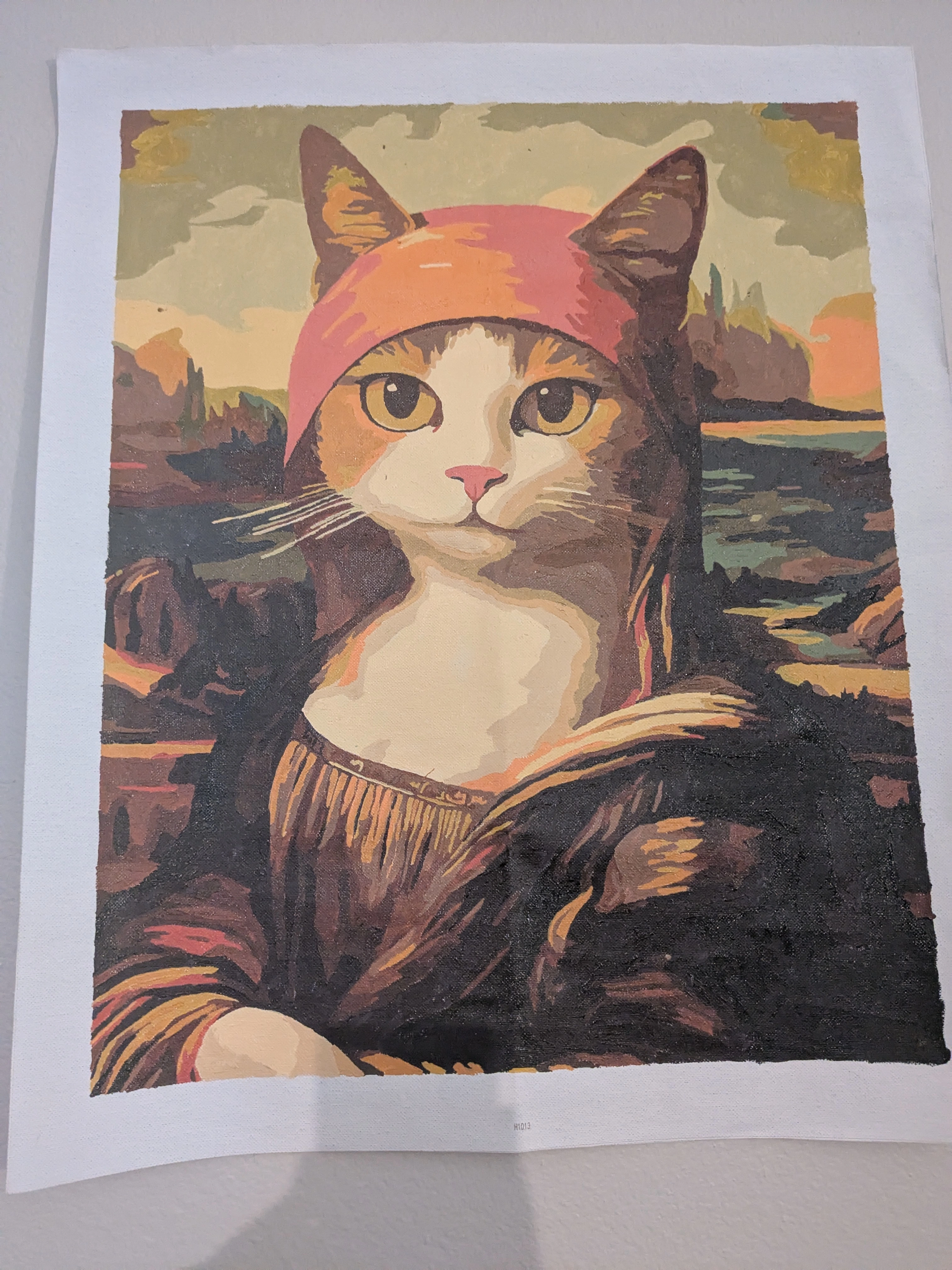A painting of a cat as Mona Lisa.