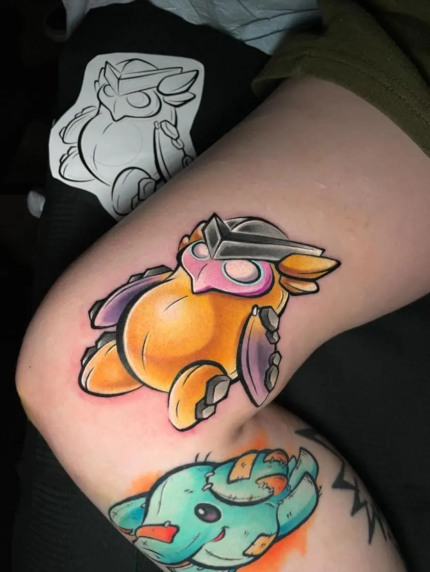 A tattoo of Wingman, a cartoon looking plush bird from the game VALORANT