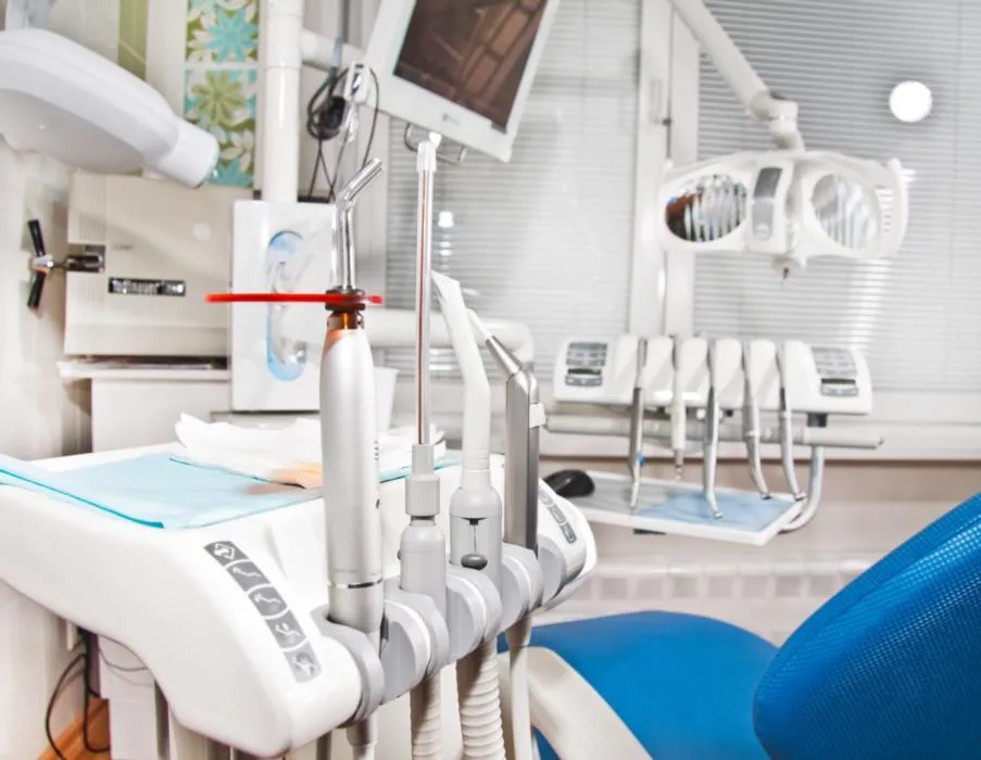 dental tools near chair in dental office