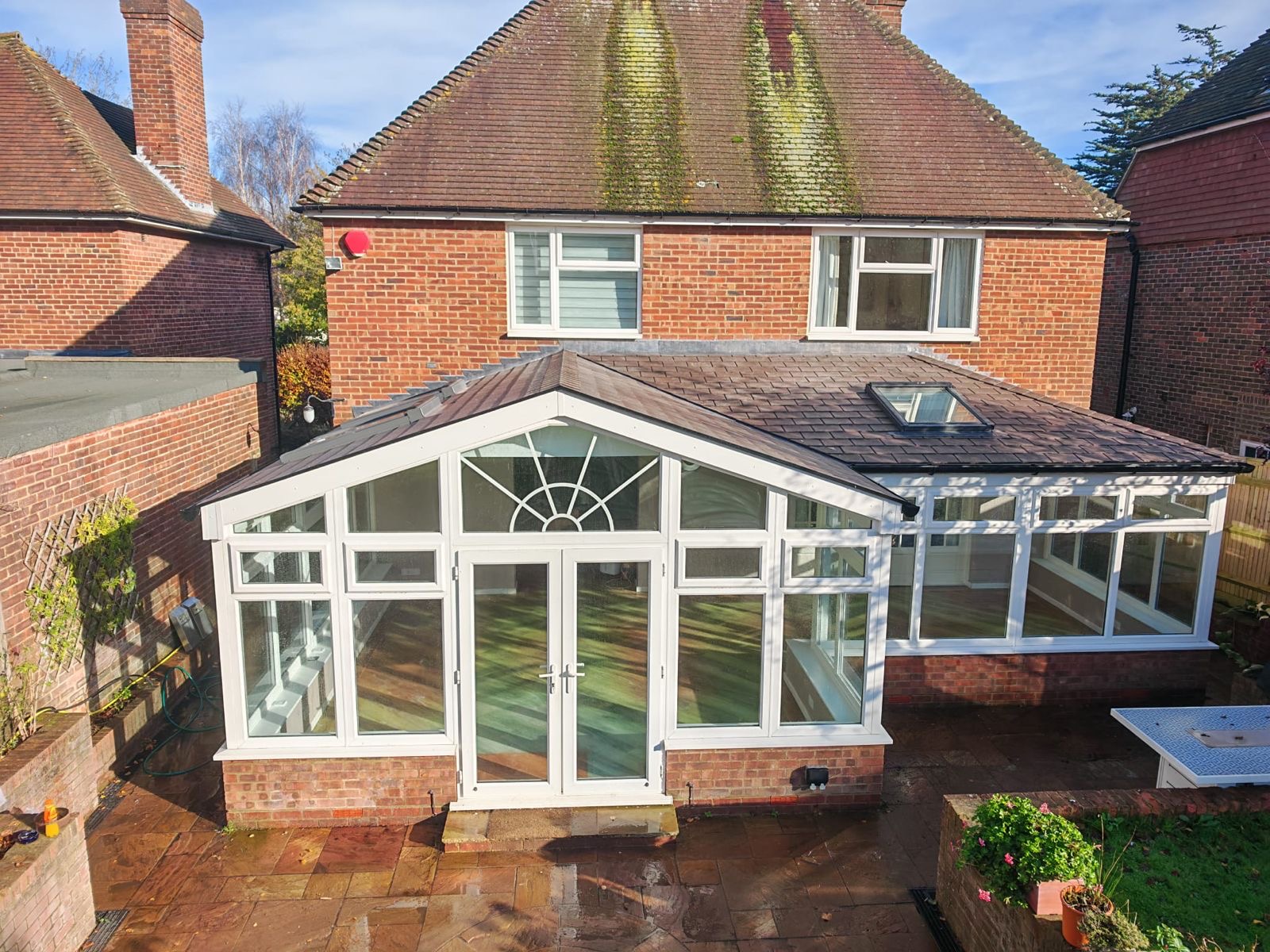 Conservatory in sunny back garden