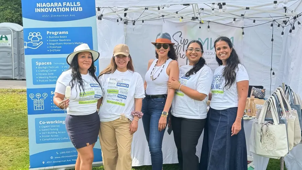 The Connect Education team at their booth at a community festival