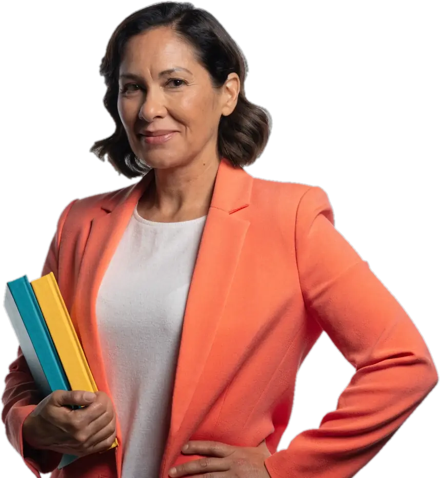 Smiling certified teacher in a coral blazer holding books