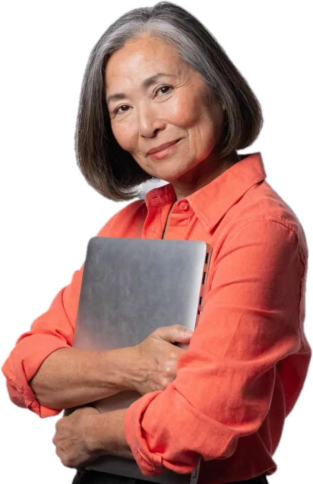 Smiling experienced teacher in a coral shirt holding a laptop, ready to start tutoring