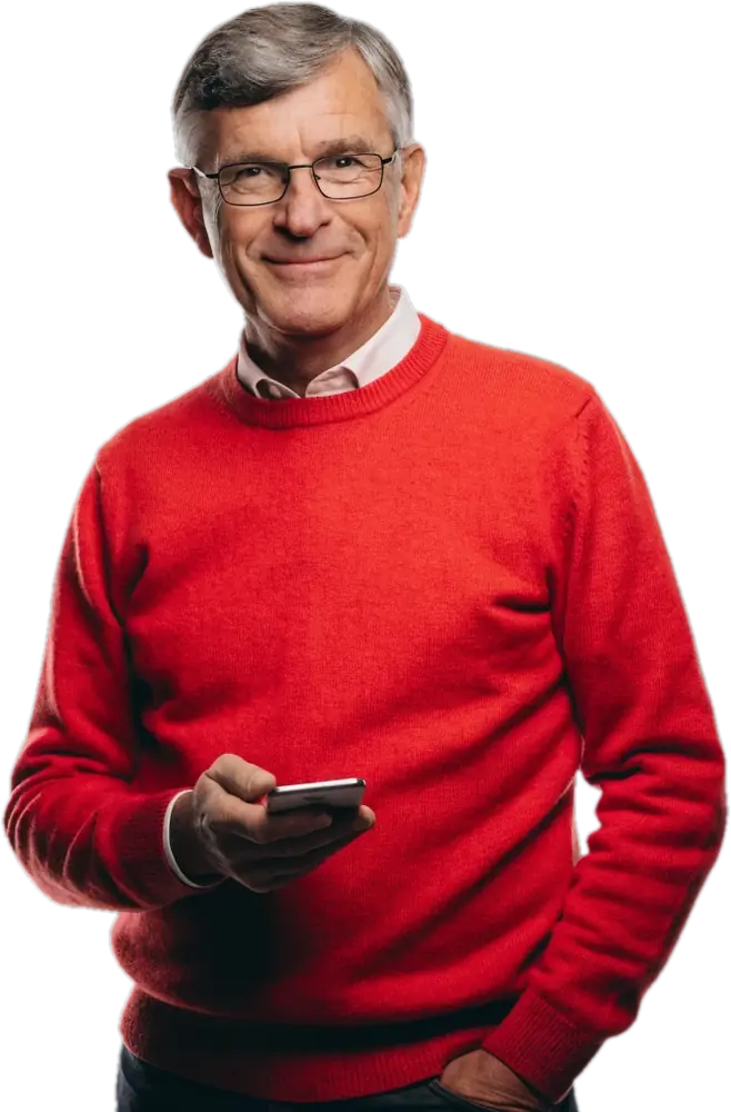 Working father in glasses checking tutoring options on his phone