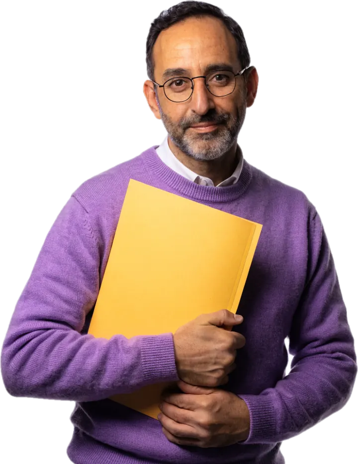Smiling certified teacher in glasses and a lilac sweater holding a yellow folder