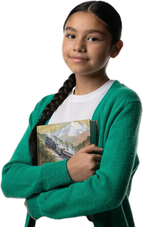 Girl in a green cardigan hugging a book with a mountain landscape on the cover