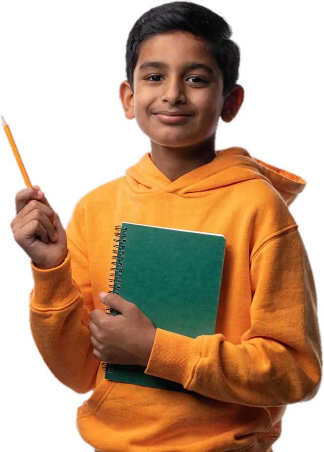 Boy in a marigold hoodie holding a green notebook and a pencil
