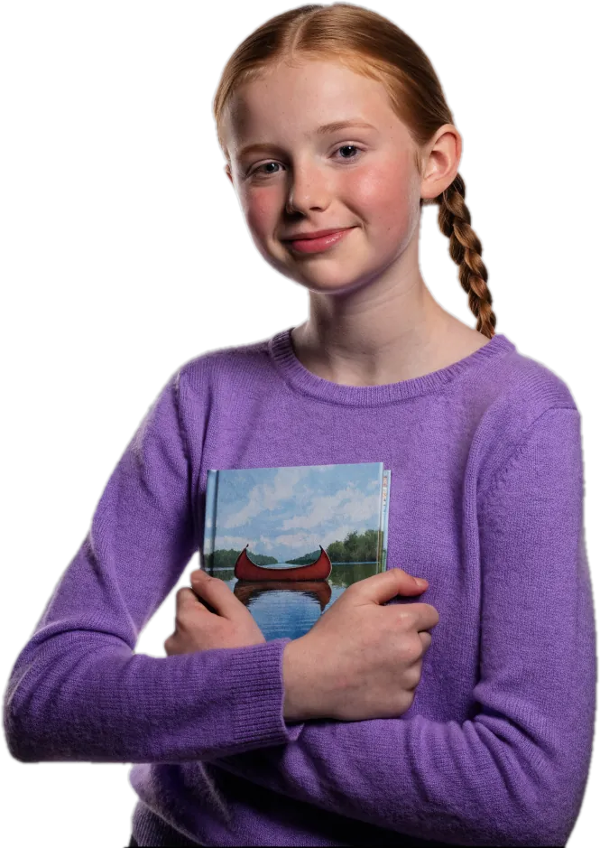Girl in a lilac sweater hugging a book with a red canoe on the cover