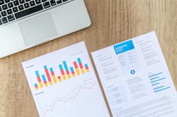 Papers with graphs on a table