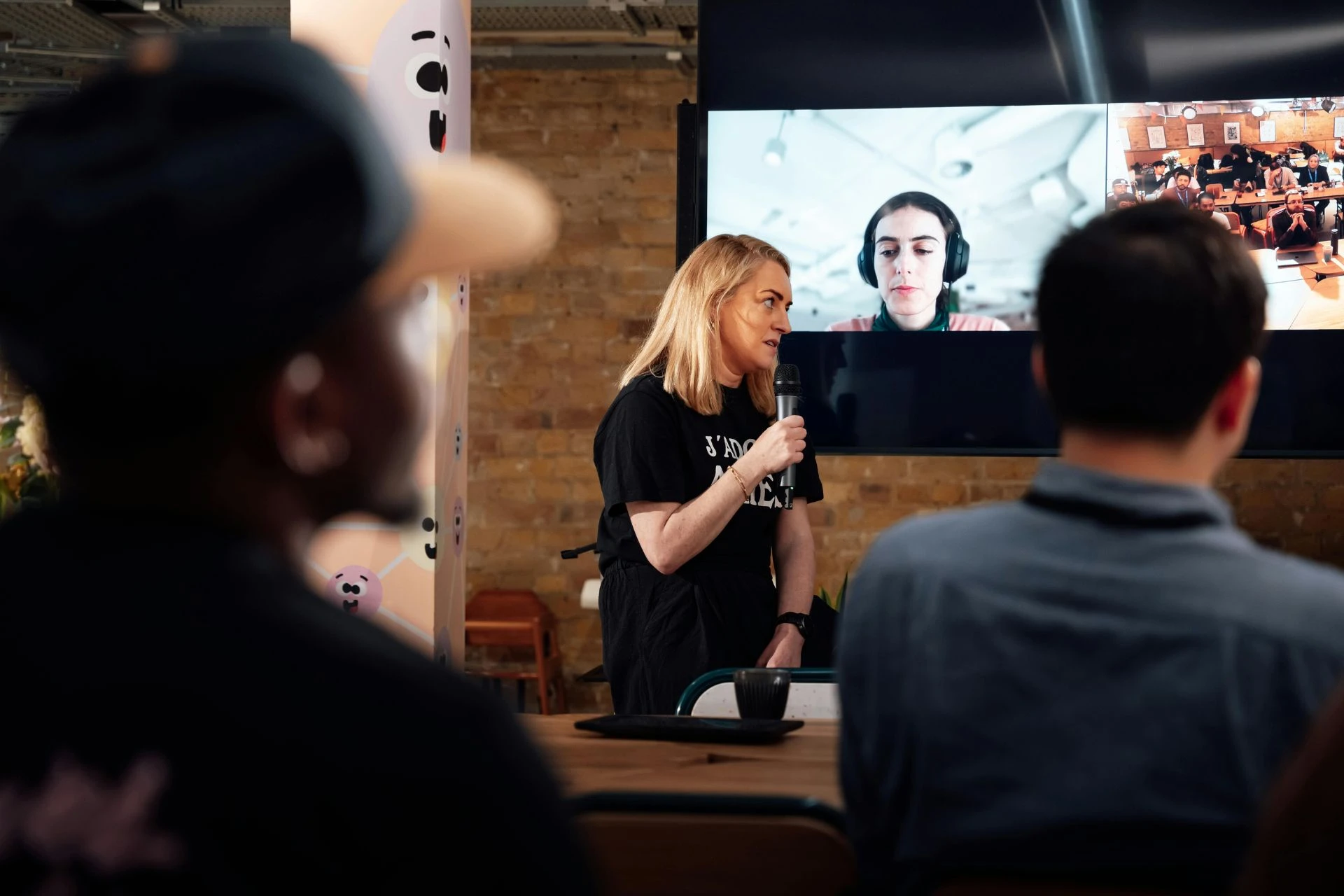 A speaker talking in a hybrid conference