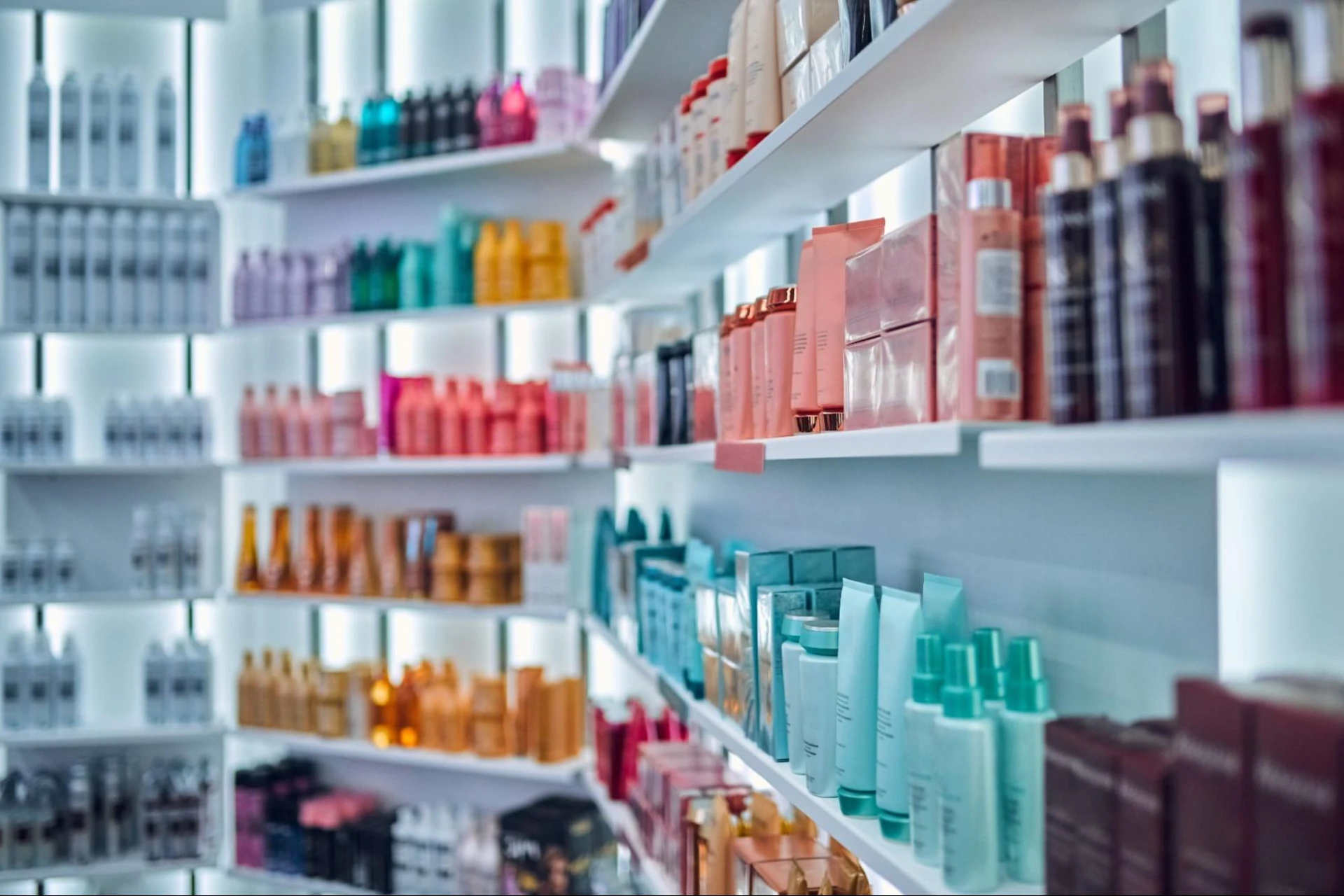 A beauty retailer’s shelves lined with beauty products.