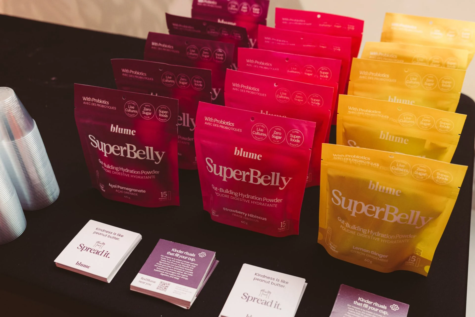 Branded products in a pouch alongside some cards