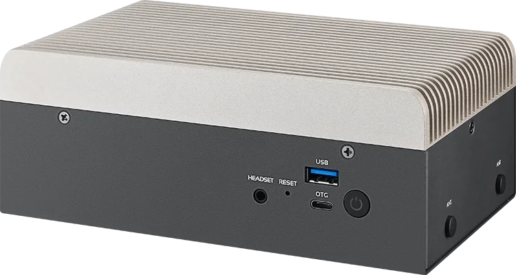 Compact black and gray electronic device with USB ports, power button, headset jack, and cooling fins on top.
