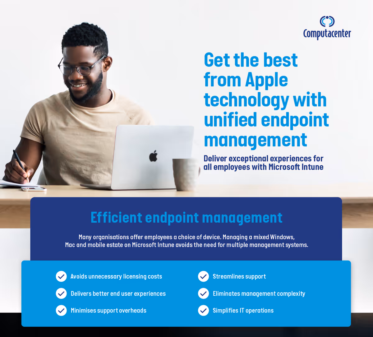 Smiling man using Apple laptop and taking notes with text about unified endpoint management and Microsoft Intune benefits.
