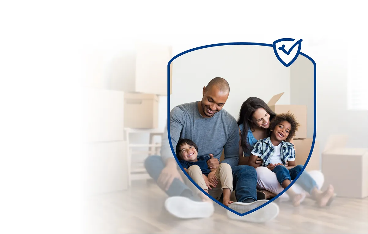 Happy family of four sitting on the floor surrounded by moving boxes, framed inside a shield icon with a checkmark.