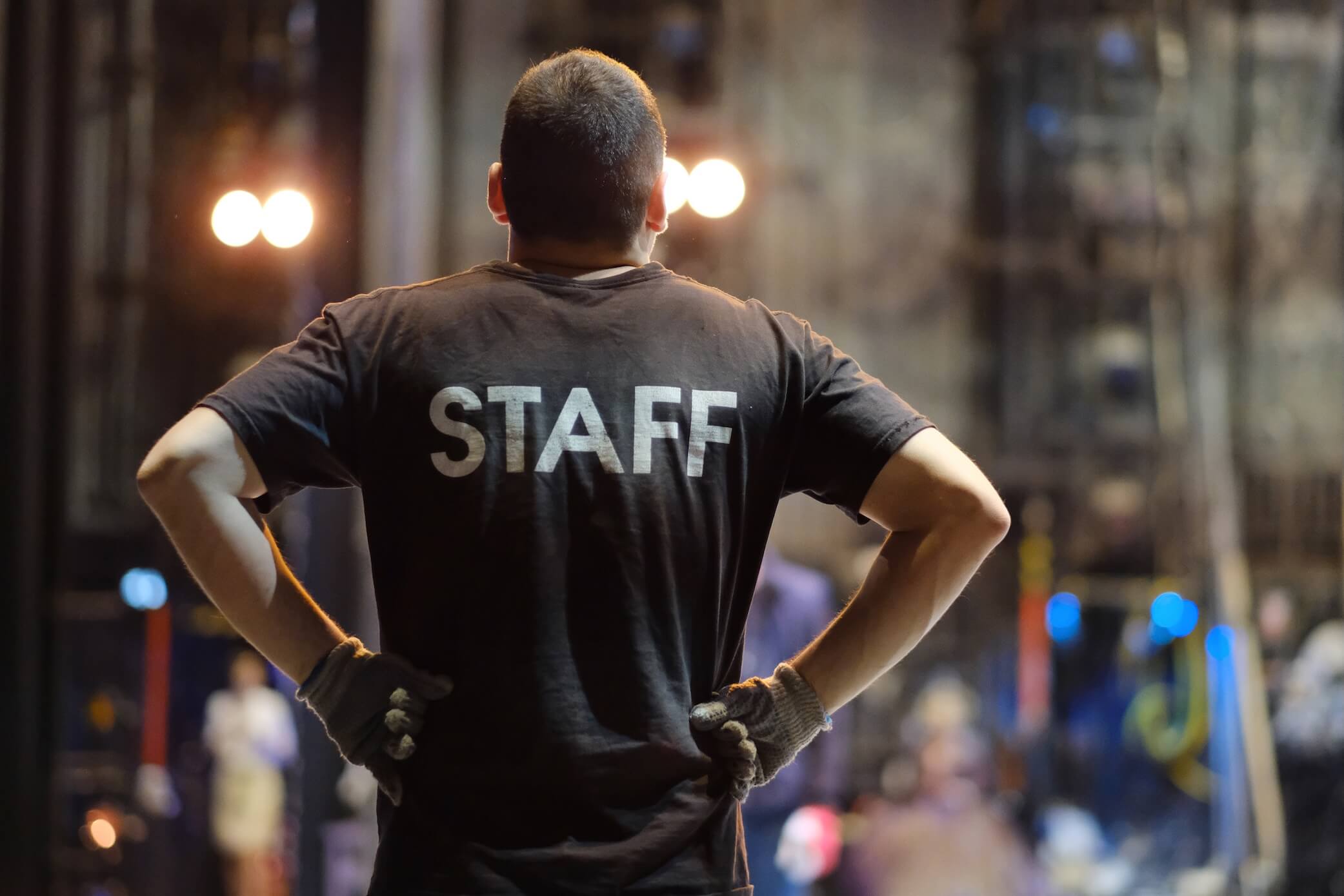 Event delivery team preparing a live environment before doors open, highlighting the importance of professional on-site delivery.
