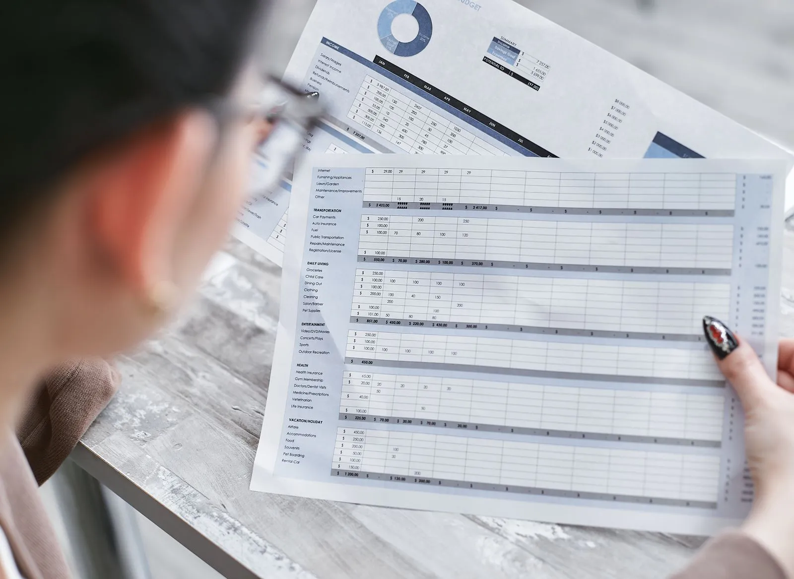 Financial controller reviewing spreadsheets amid the UK's qualified accountant shortage