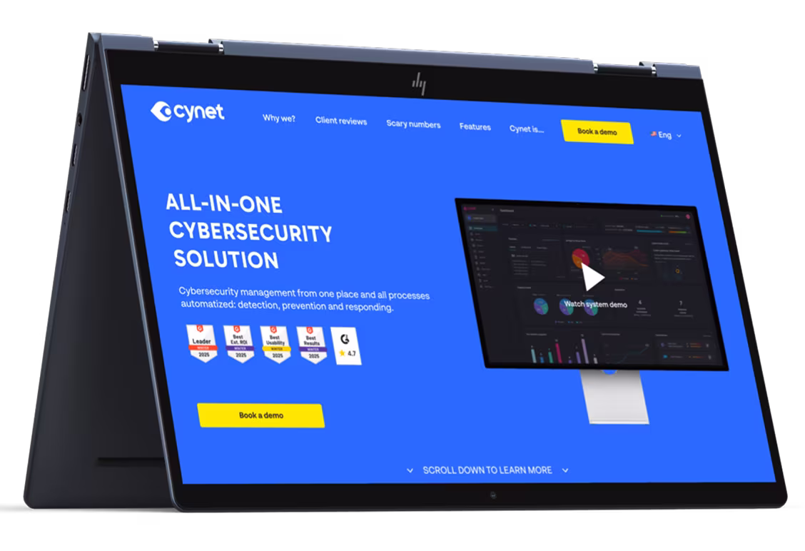 HP laptop in tent mode displaying Cynet cybersecurity website with blue background and yellow book a demo buttons.