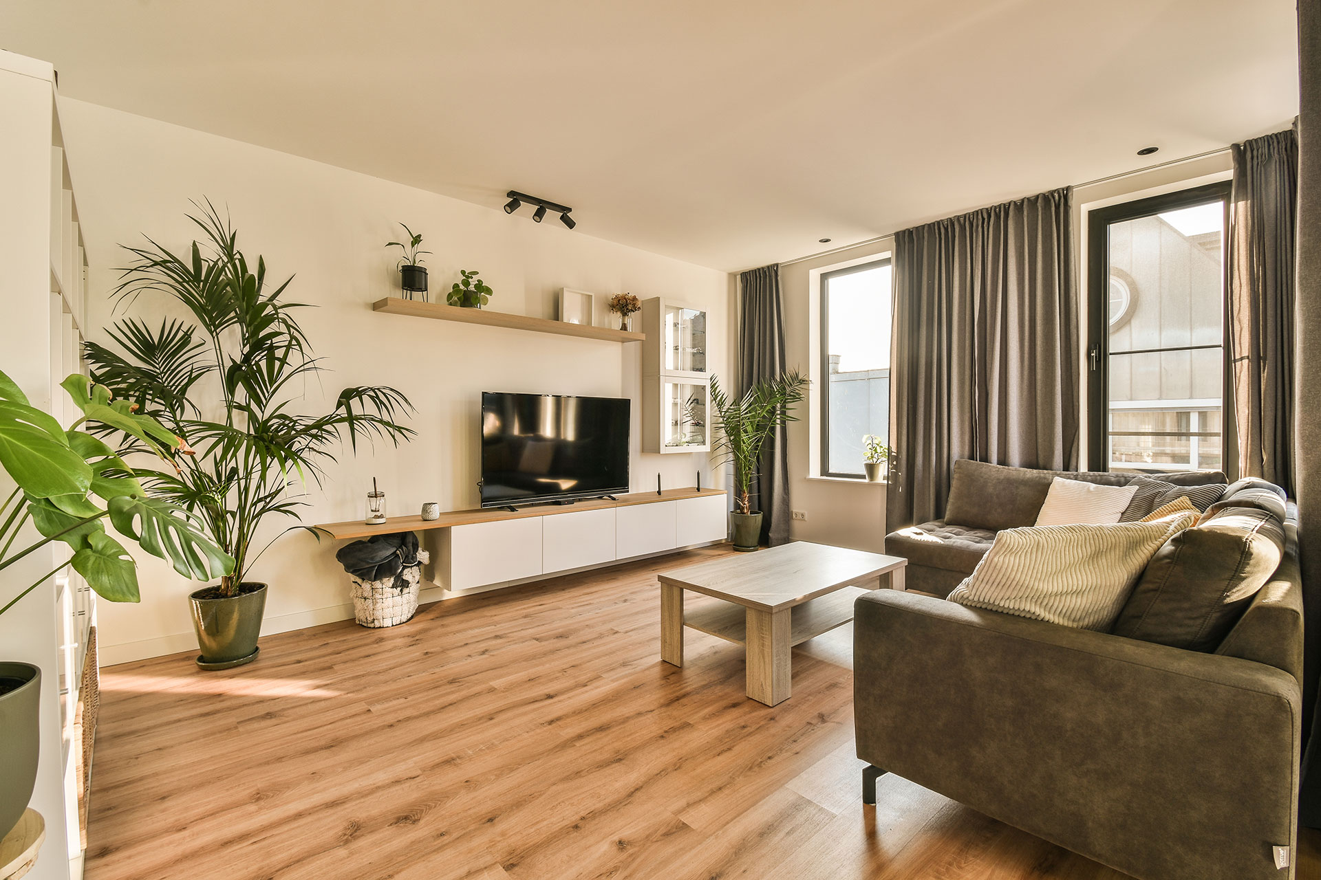 Interior featuring vinyl plank flooring, known for its durability, versatility, and stylish wood-look finish.