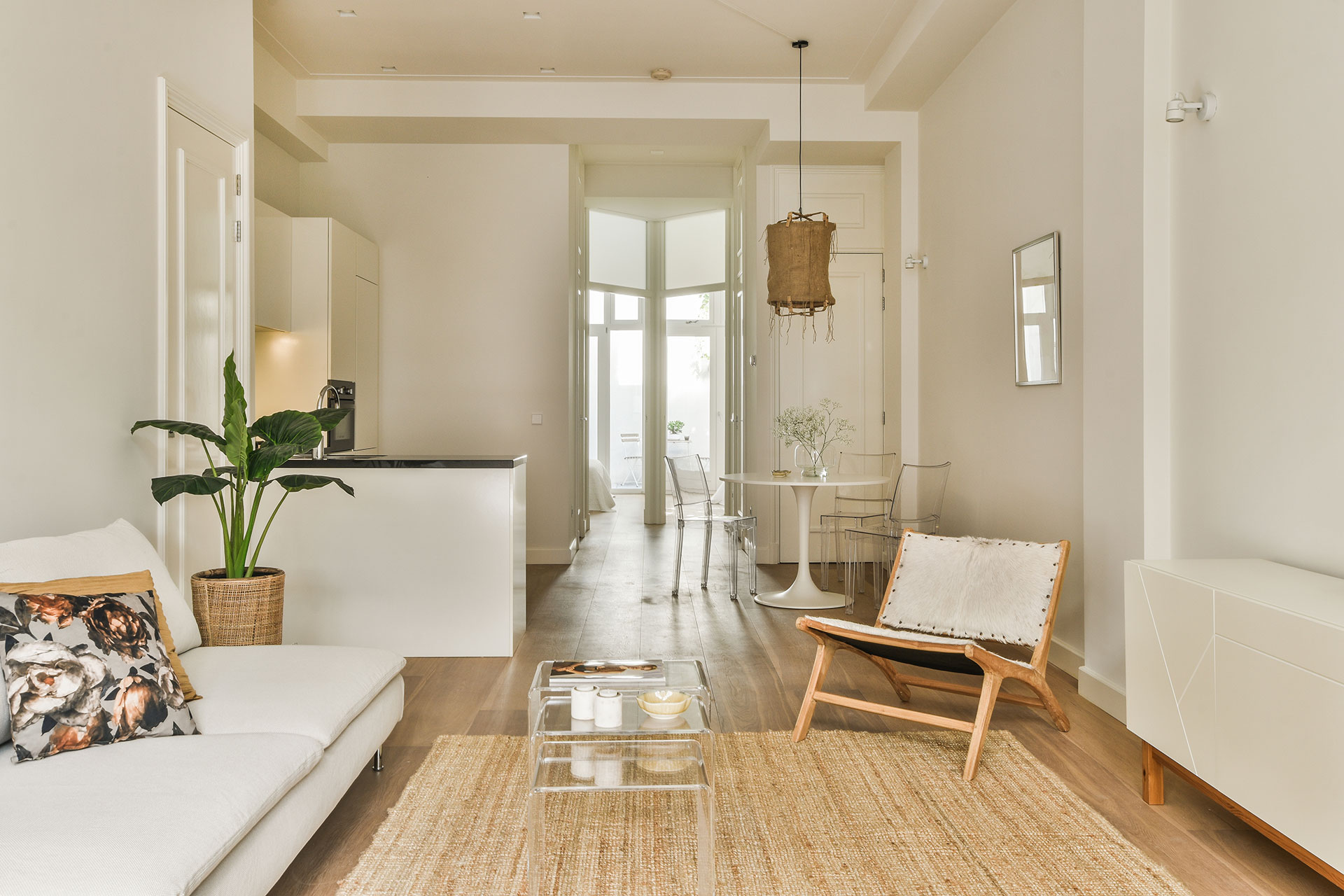 Elegant home interior with engineered timber flooring in a smooth, mid-tone finish. Adds refined warmth and sophistication to the modern design.