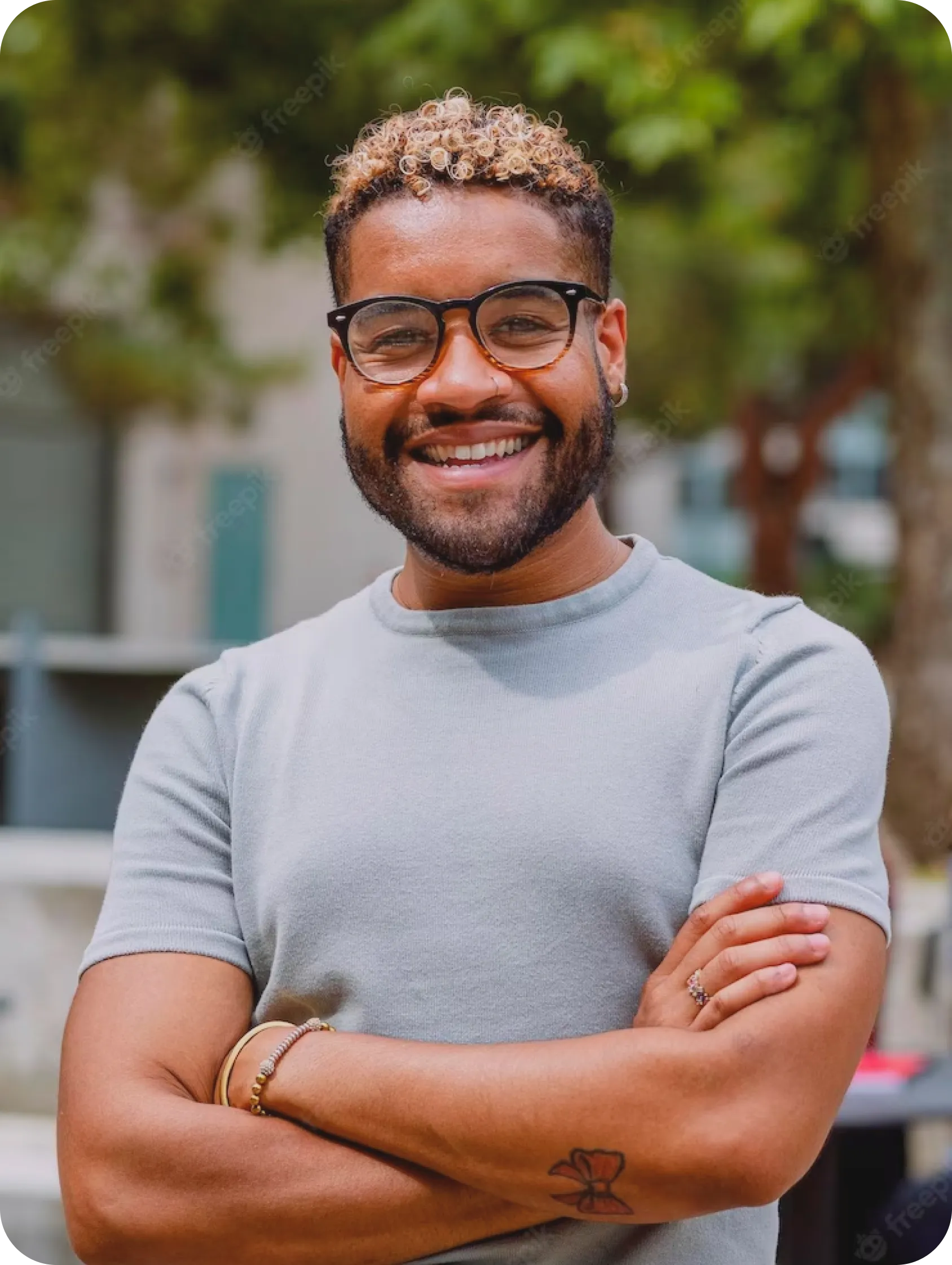 Man  in grey shirt smiling