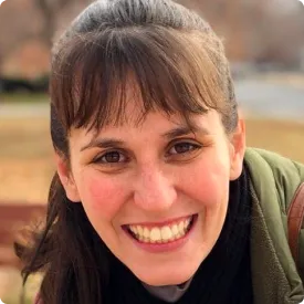 A woman smiling