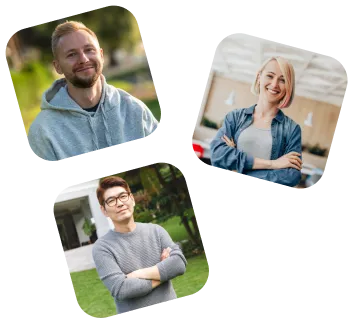 Three people smiling