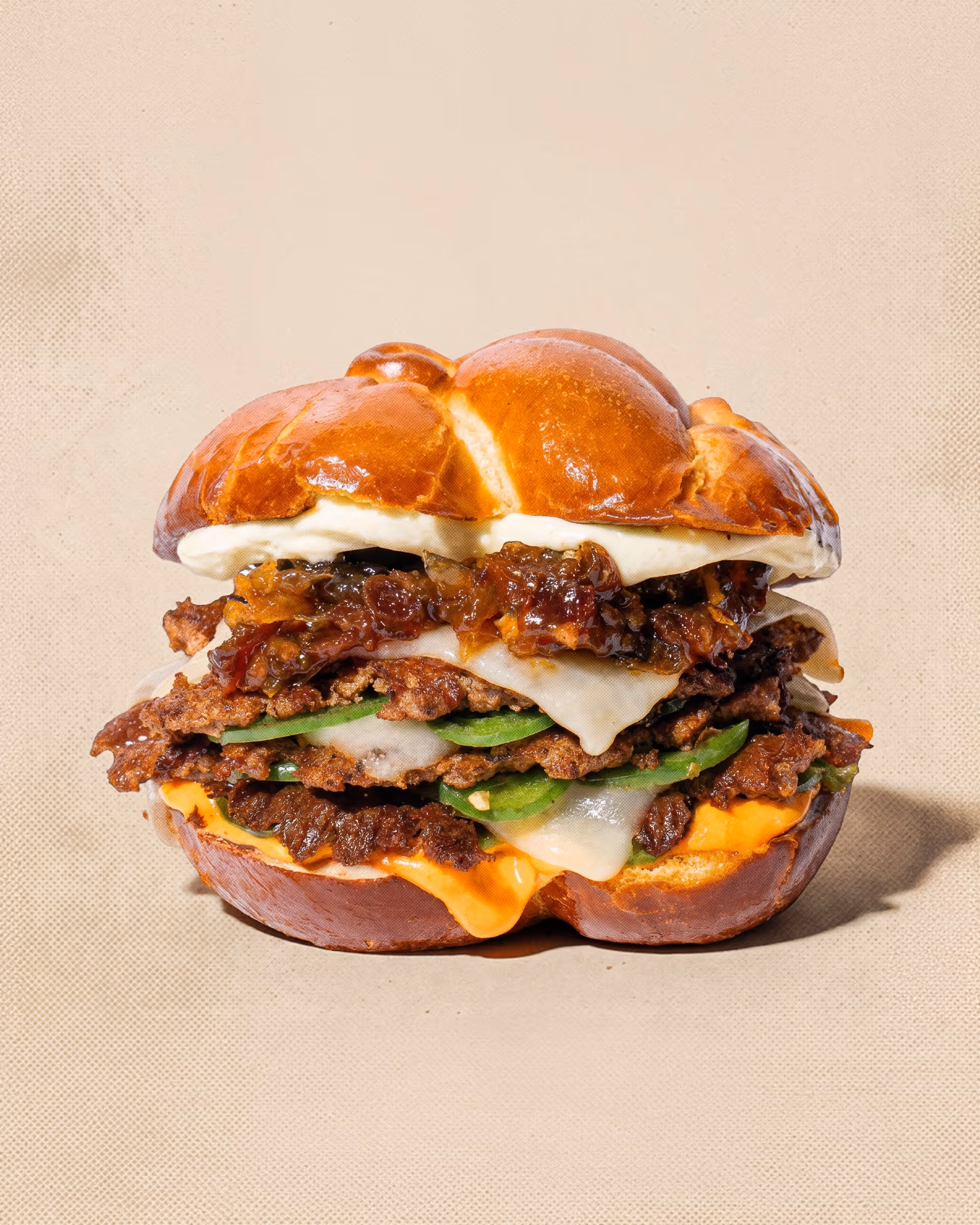 Brome Caesar Got Smashed: smash patty with crispy parm, baby gem, and anchovy aioli on a brioche bun