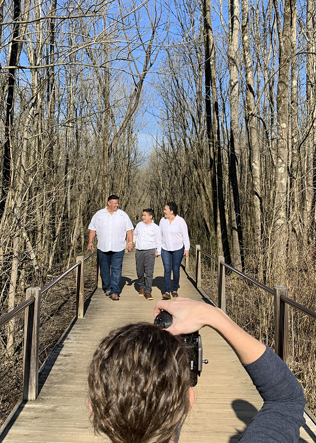 Ashley photographing a family during one of the Momento portrait session experiences  