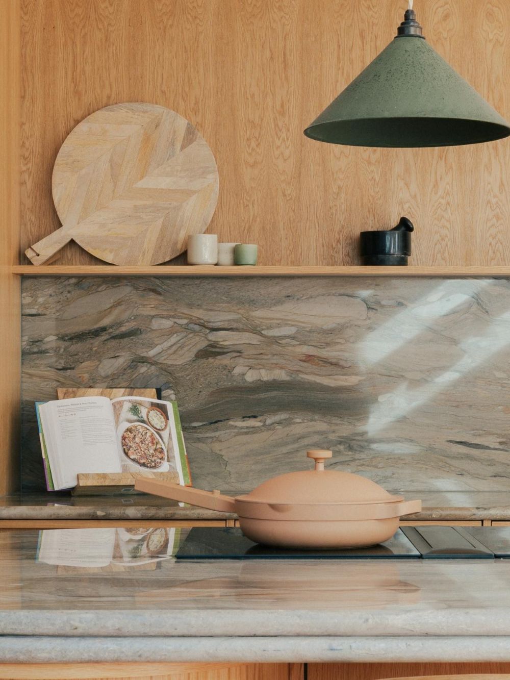 Symposion House wood kitchen renovation with island, marble worktops and open shelving in London