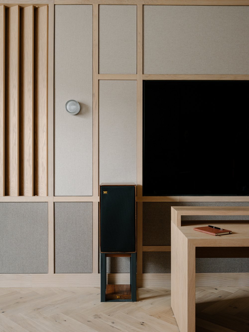 A closeup view of the Composer Studio projects workspace desk area designed by Benjamin Wilkes architecture and interior design studio