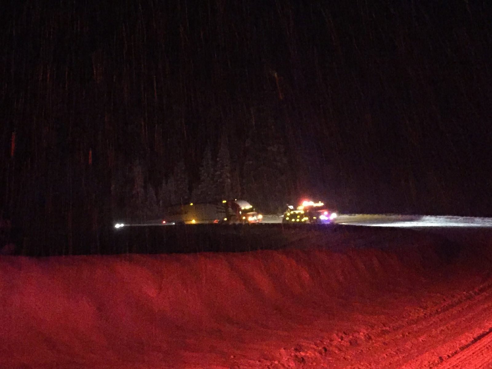 Ron's Towing working a night accident scene on a Wyoming highway
