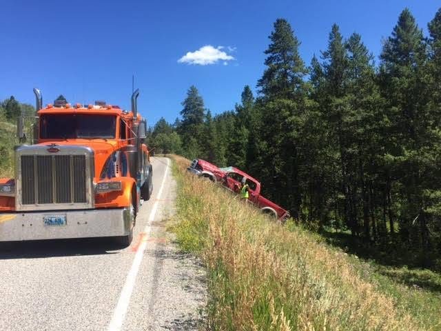 Roadside recovery on a canyon shoulder near Alpine, Wyoming