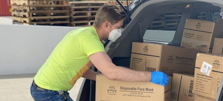 A man packing his belongings