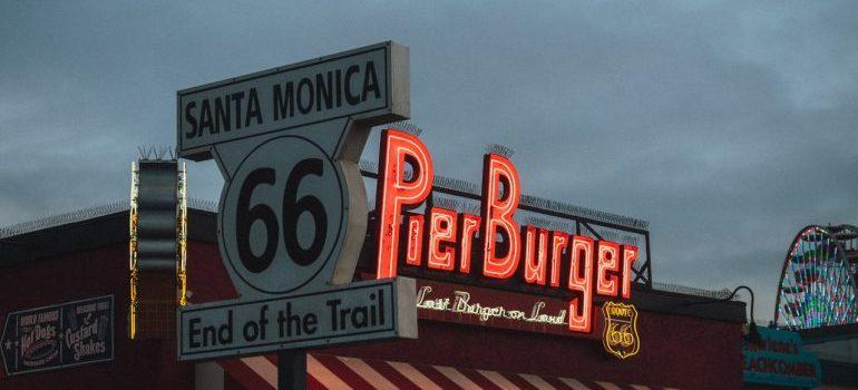Fast food restaurant next to road sign