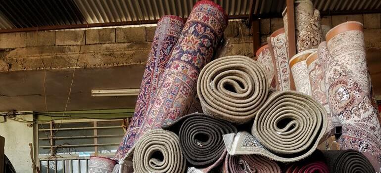 rolled carpets in the garage