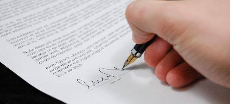 Person signing a document