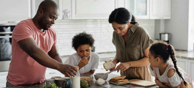 A family making breakfast together 