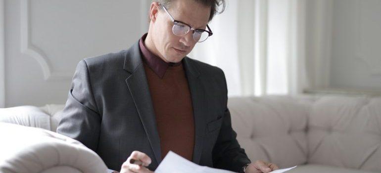 A man reading some documentation