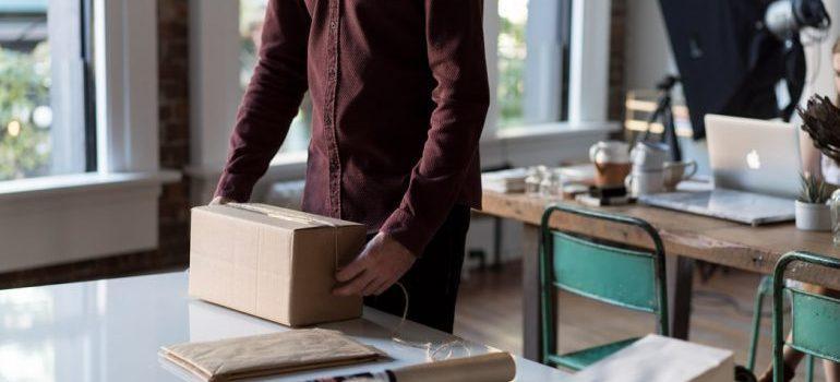 A man packing for his move