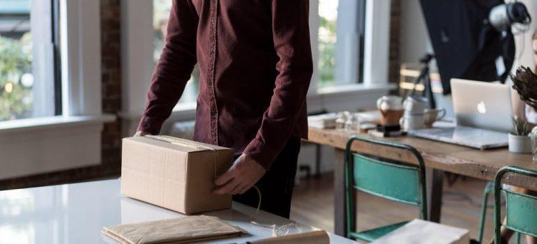 A man packing his belongings
