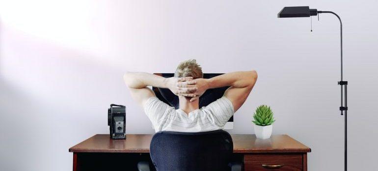 A man sitting in front of his computer