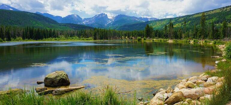 folks moving from California to Colorado and visiting a lake
