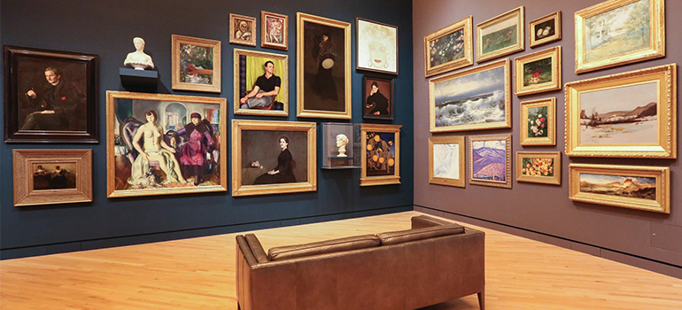 a room full of paintings